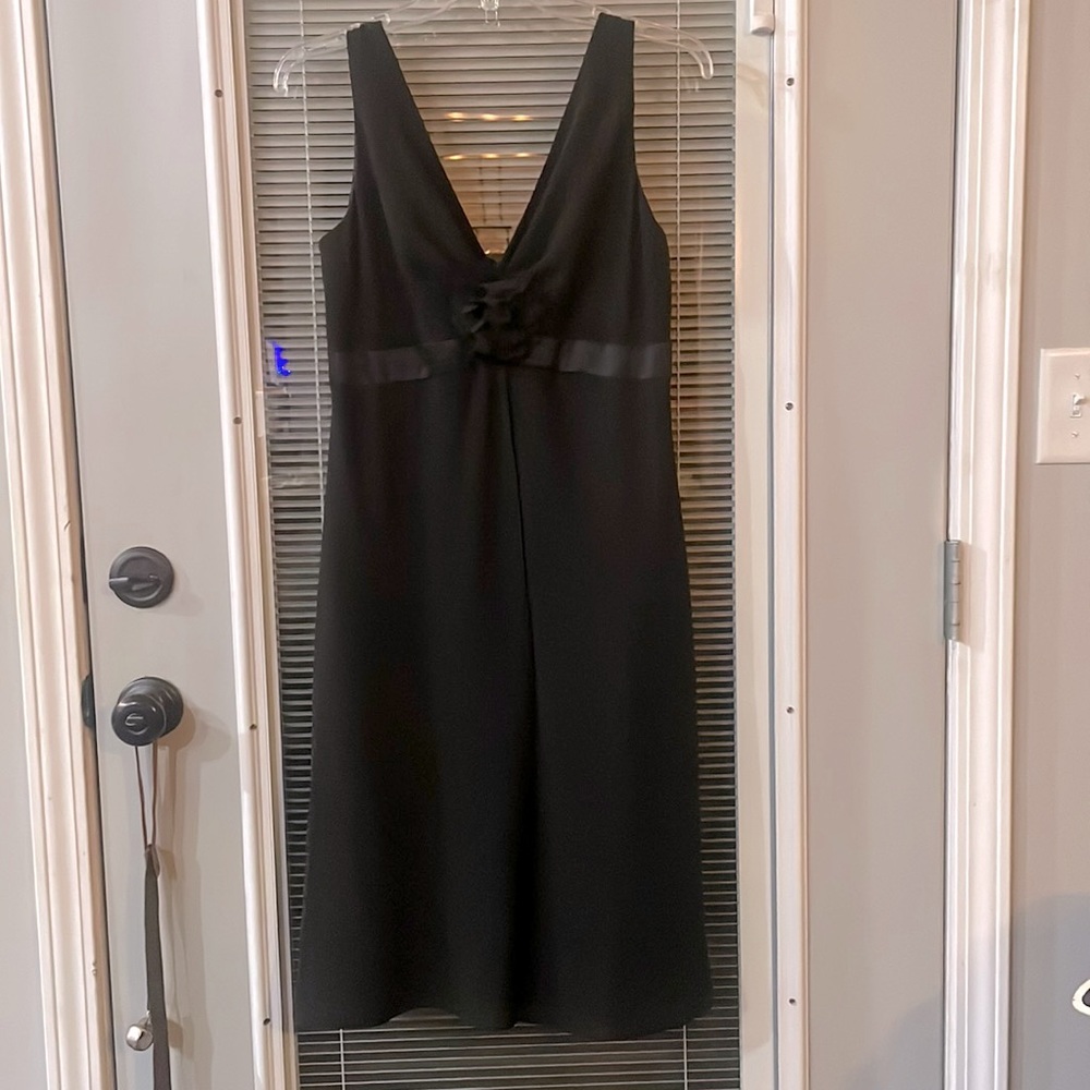 Black cocktail type dress. Great for weddings or cruise or party. Size 8.